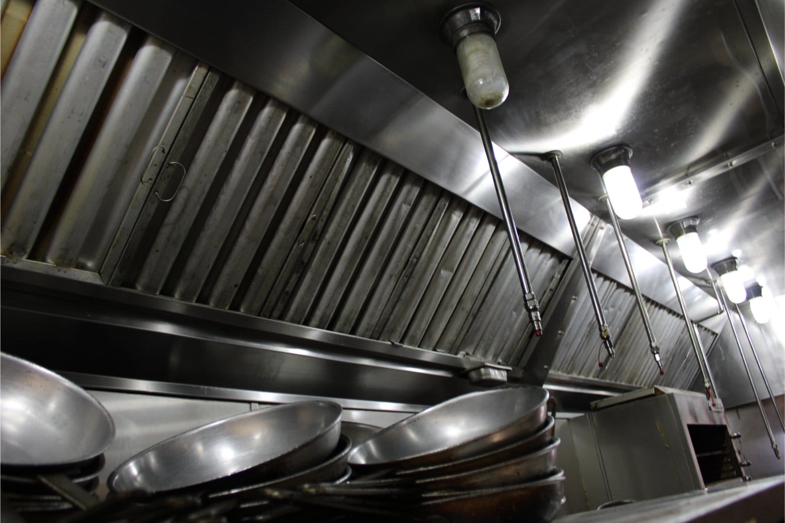 Close-up of filters in a commercial kitchen exhaust system